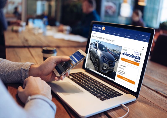 car shopper looking at Autotrader VDP with Accelerate My Deal digital retailing